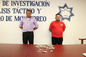 Los dos sujetos fueron asegurados con dosis de marihuana y efectivo 