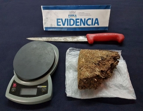 Droga y báscula asegurada